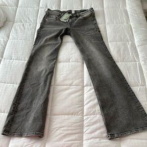 Low-raise black jeans with white-wash tone. Size 42 (10)